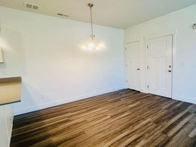 Building Photo - Brand-new Condo Conveniently Located in Ri...