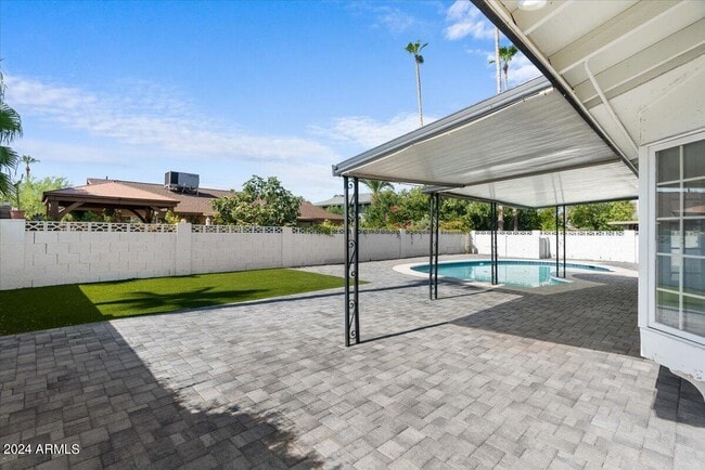 Building Photo - 8207 E Montebello Ave