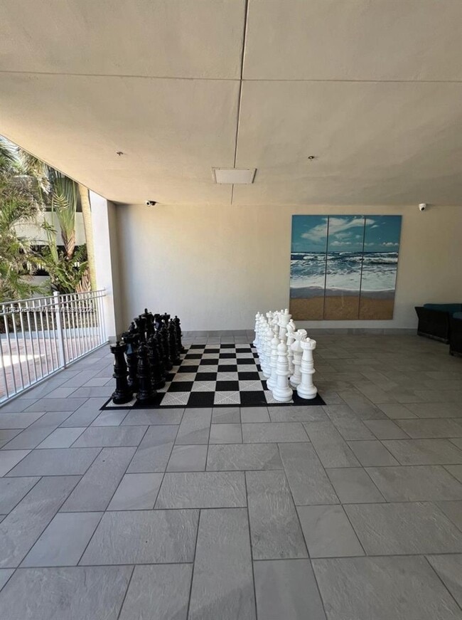 Building Photo - 19380 Collins Ave