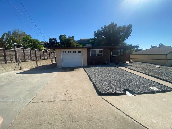 Building Photo - Completely Remodeled 2 Bed, 1 Bath with Garage and Large Yard!