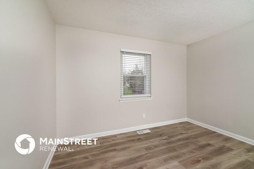 Building Photo - 1303 Woodcreek Dr