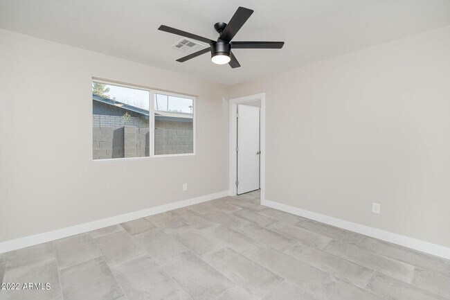 Building Photo - 9209 N 48th Dr