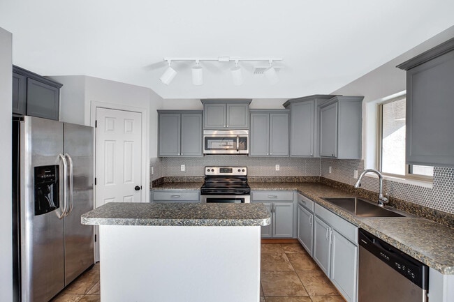 Building Photo - 9547 E Belmont Ave