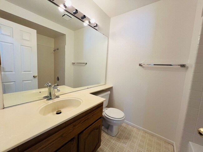 Building Photo - Spacious and Sparkling with New Paint 3 be...