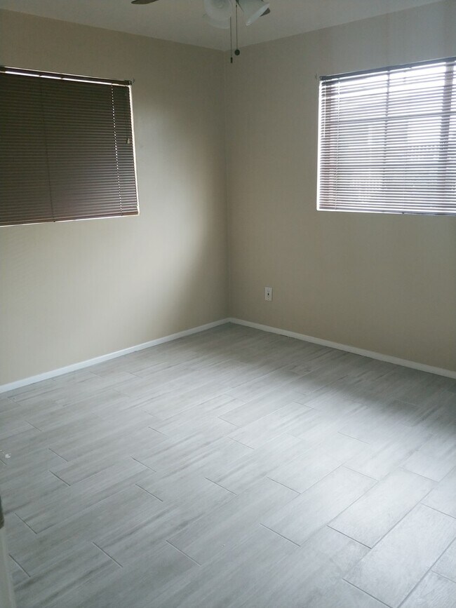 Building Photo - For Rent in Youngtown. Upgraded Kitchen, Tile, Carpet, Covered Parking, Single Level
