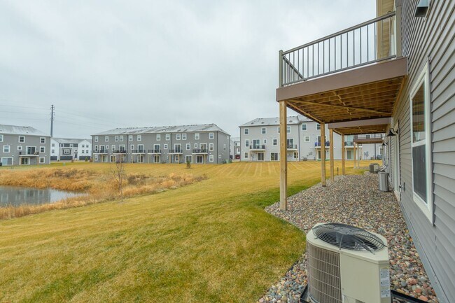 Building Photo - Awesome maple grove 5 bed 4 bath townhome! Pond views, 2 years old!