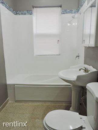 Building Photo - 2 br, 1 bath Condo - 6129 S Eberhart Ave 3...