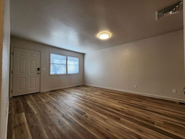 Building Photo - Renovated Cozy 2-Bedroom Duplex | Move In Now – Next Month’s Rent is Waived!