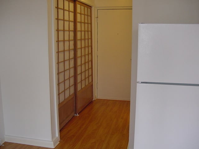 Building Photo - Holiday Manor studio, secured building, laminate wood flooring!