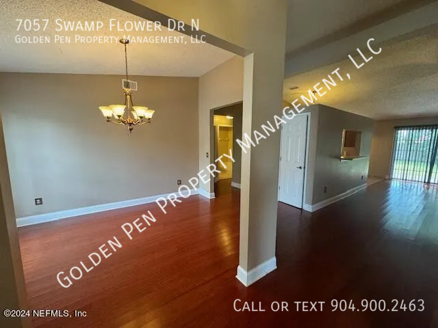 Building Photo - 7057 Swamp Flower Dr N