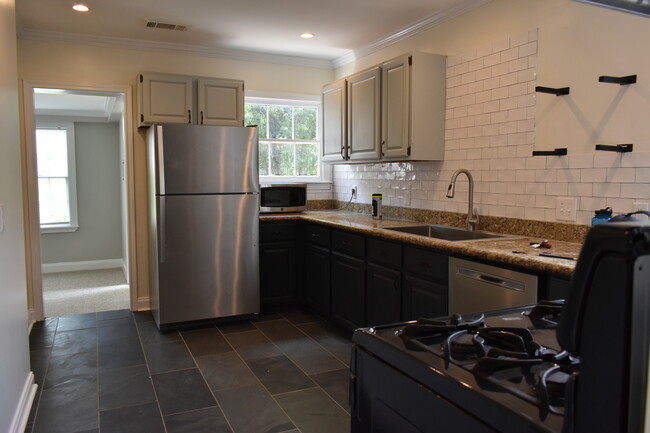 (upstairs unit kitchen shown) downstairs unit kitchen similarly styled - 2303 Goldsmith St