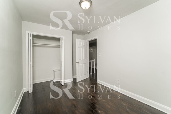 Building Photo - The living is easy in this 4 bedroom, 2 bathroom townhome