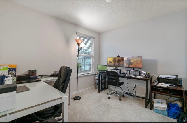 Building Photo - Water Front Home- 4 Large Bedrooms-3 baths Gated Community Call Sheila Campbell 407-687-7900