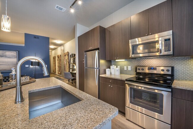 Building Photo - Modern Design Meets Everyday Luxury