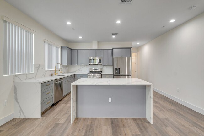 Building Photo - A beautifully designed and renovated 4 bed...