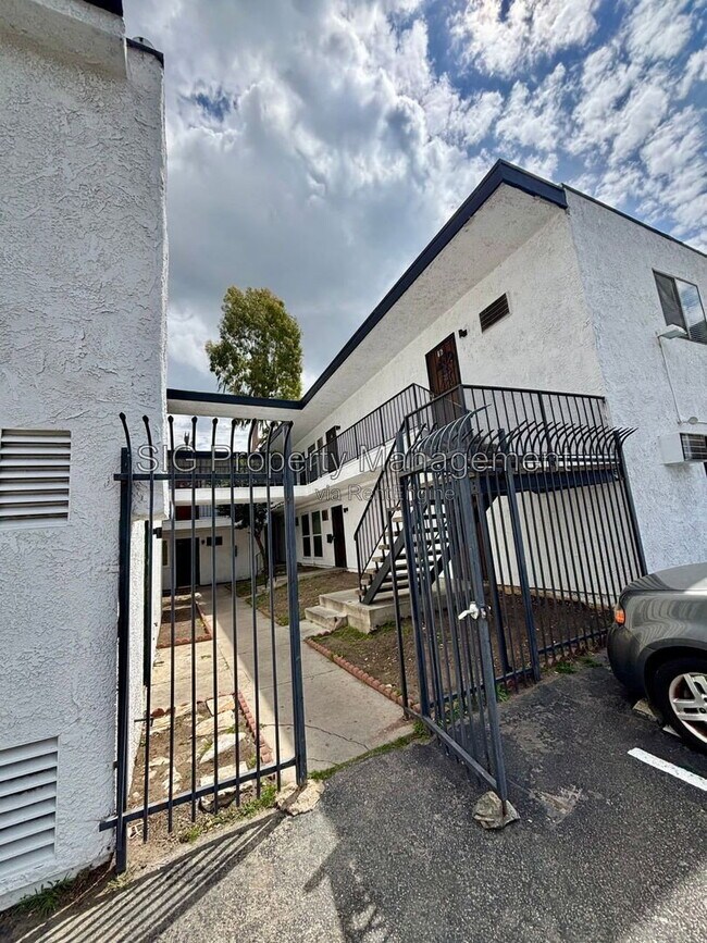 Building Photo - 10635 Sherman Grove Ave