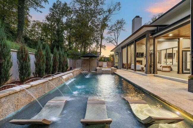 Building Photo - Experience elevated living in this fully furnished luxury residence