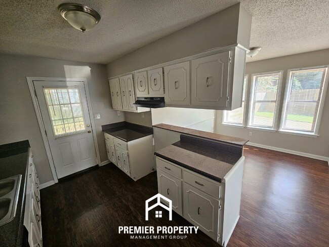 Building Photo - Stunning 3BR/2BA Home | 1,644 Sq Ft, Floor-to-Ceiling Stone Fireplace & High Ceilings