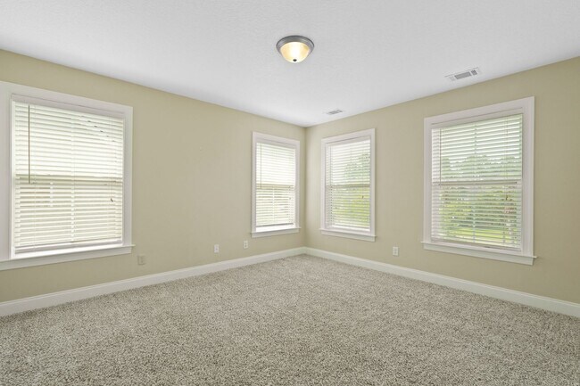 Building Photo - 3 Bedroom Dunham Marsh Beauty with Outdoor Fireplace and Resort-Style Community Amenities