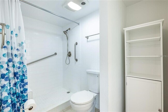 Building Photo - 5950 Pelican Bay Plaza S