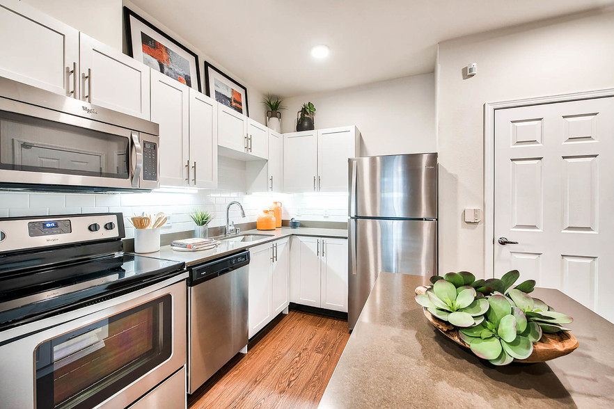 Renovated kitchens with stainless steel appliances - Reflections by Windsor