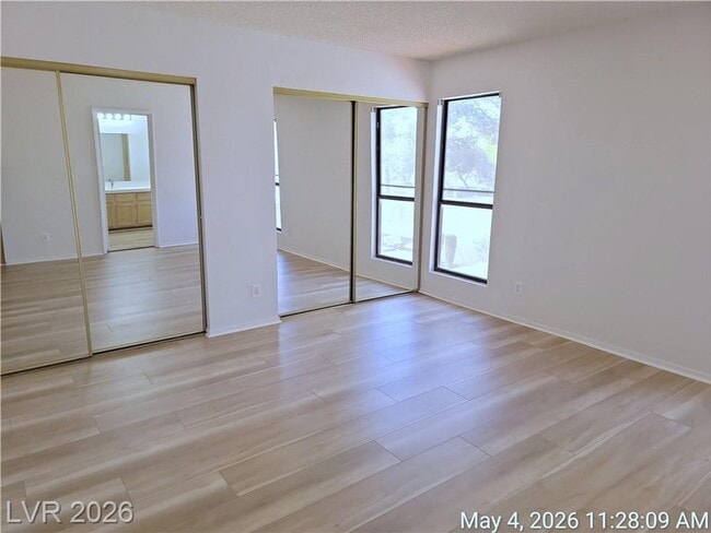 Building Photo - The Lakes Home with No Carpet, Fireplace & Covered Patio