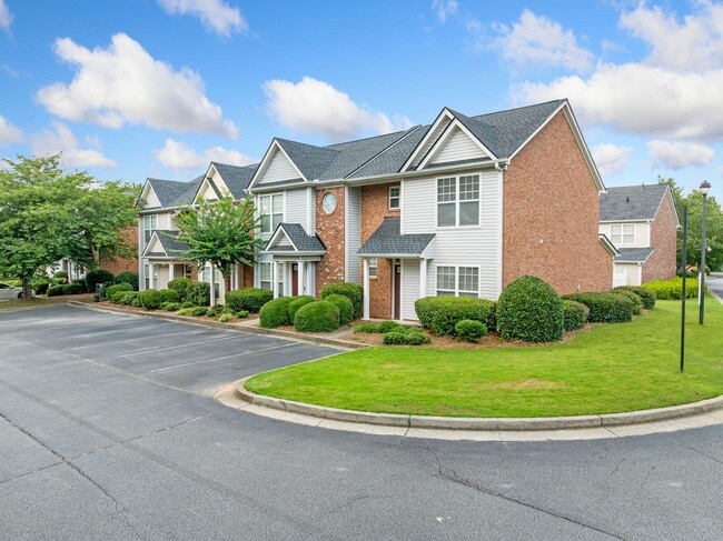 Building Photo - 3-bedroom, 2.5-bath end-unit townhome in the Garrison Square