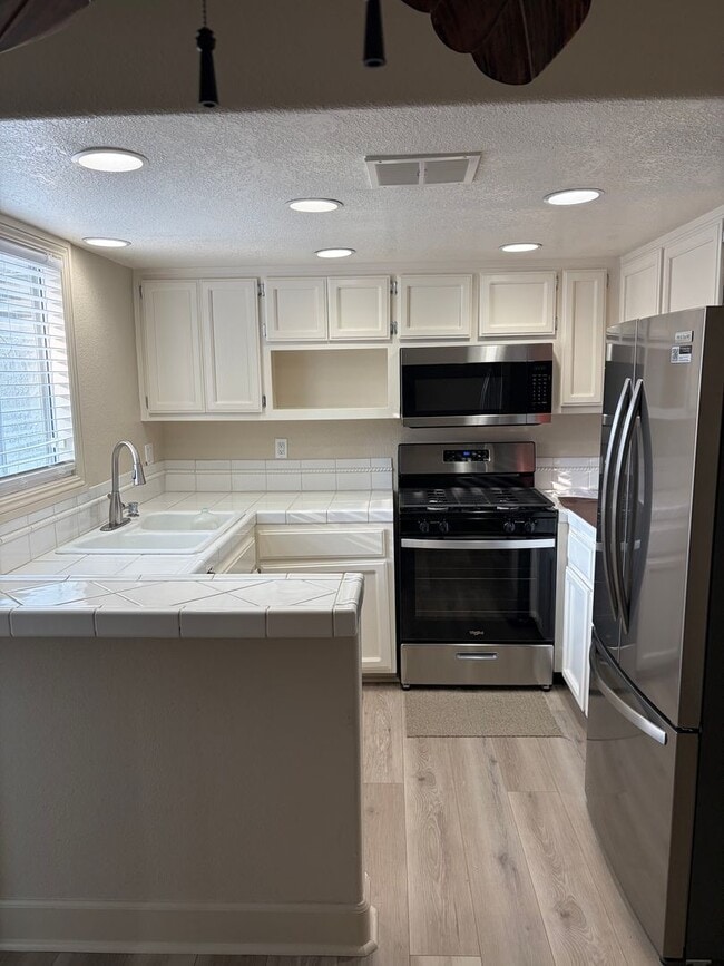 Building Photo - Cozy Loft-Style Studio - For Rent