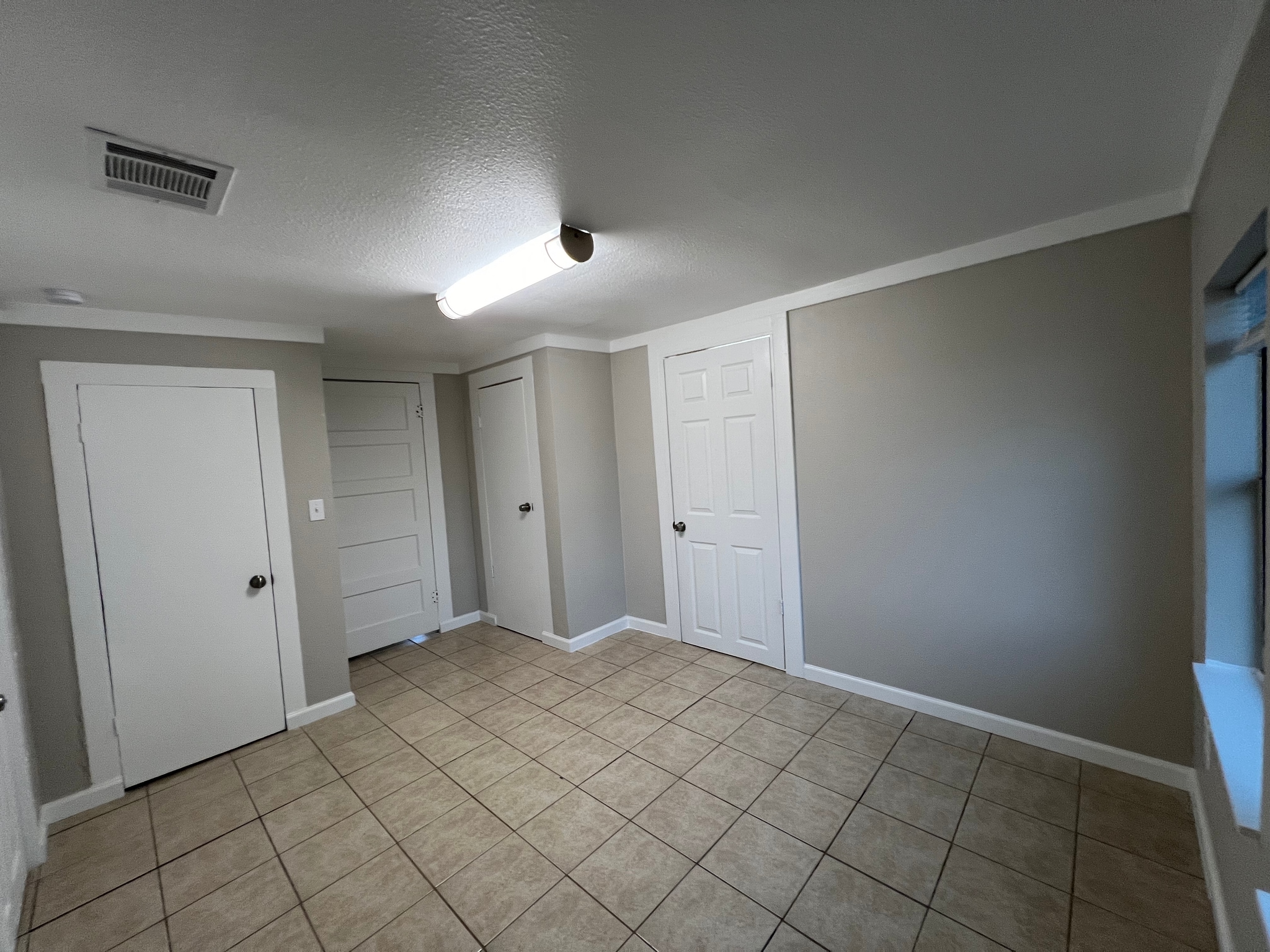2nd Bedroom - Door1 to Bth Room & Door2 Closet 1 & Door3 to Kitchen & Door 4 Closet 2 & Door 5 to La - 2900 County Road 285