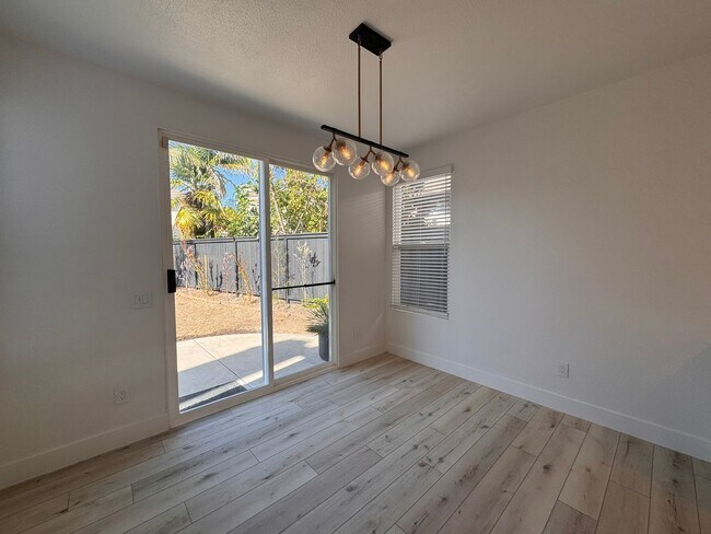 Building Photo - Stylish Renovated Home with Garage & Priva...