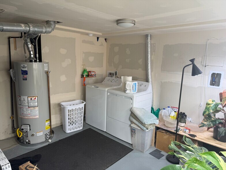 Basement Laundry and storage. - 7101 Clay St