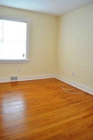 Building Photo - 3 BR/ 1 BA Lakeside Three bedroom with large fenced yard and detached garage/workshop