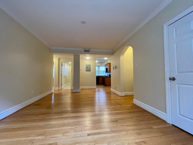 6219 N Rosebury Ave. Living Room w Big Closet Door - Rosebury Rentals