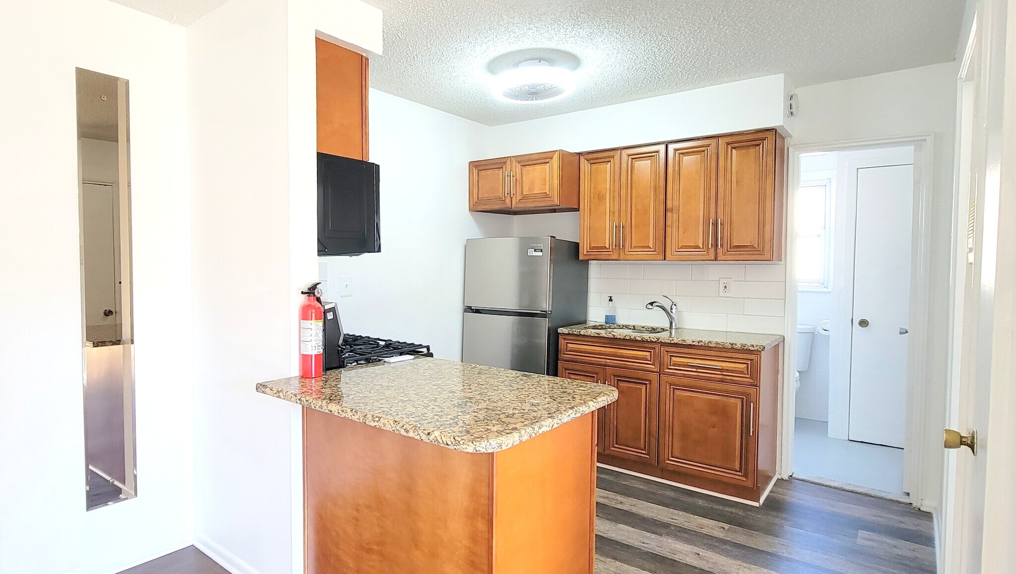 Kitchen w vinyl flooring - 17 Cuozzo St