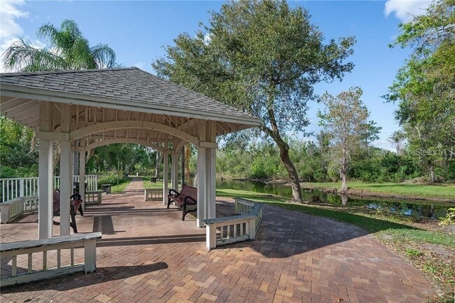 Building Photo - Seurat Street, Orlando, FL 32819 - 4 BR 2 BA condo