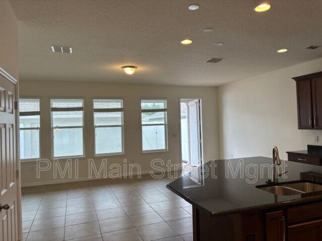 Building Photo - 8130 Red Stopper Ln