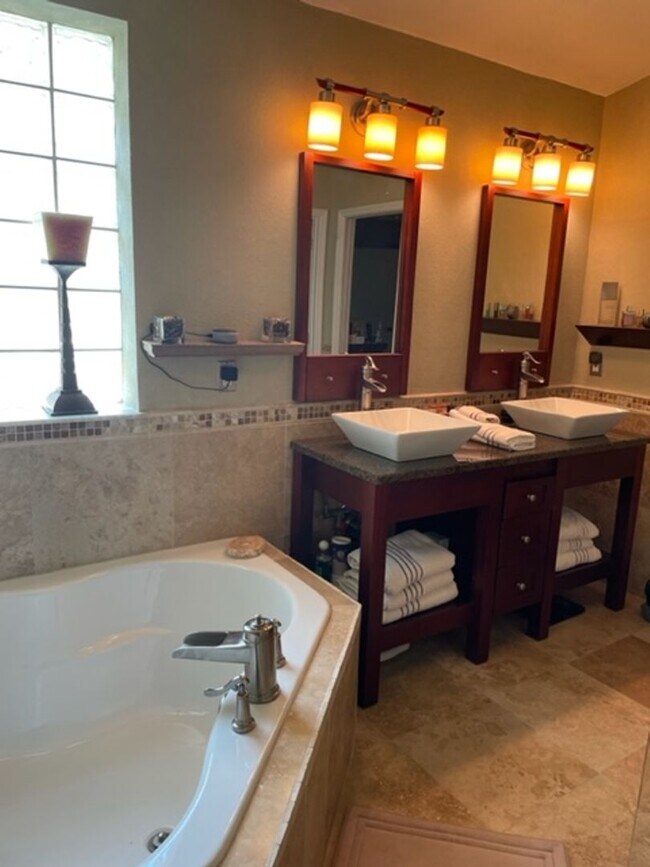 Building Photo - Lakefront 3-Bedroom Pool Home in Gated Com...