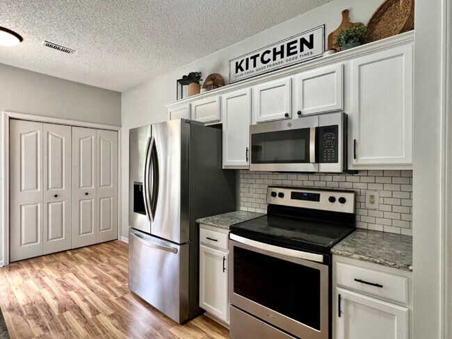 Building Photo - OPEN and SPACIOUS!