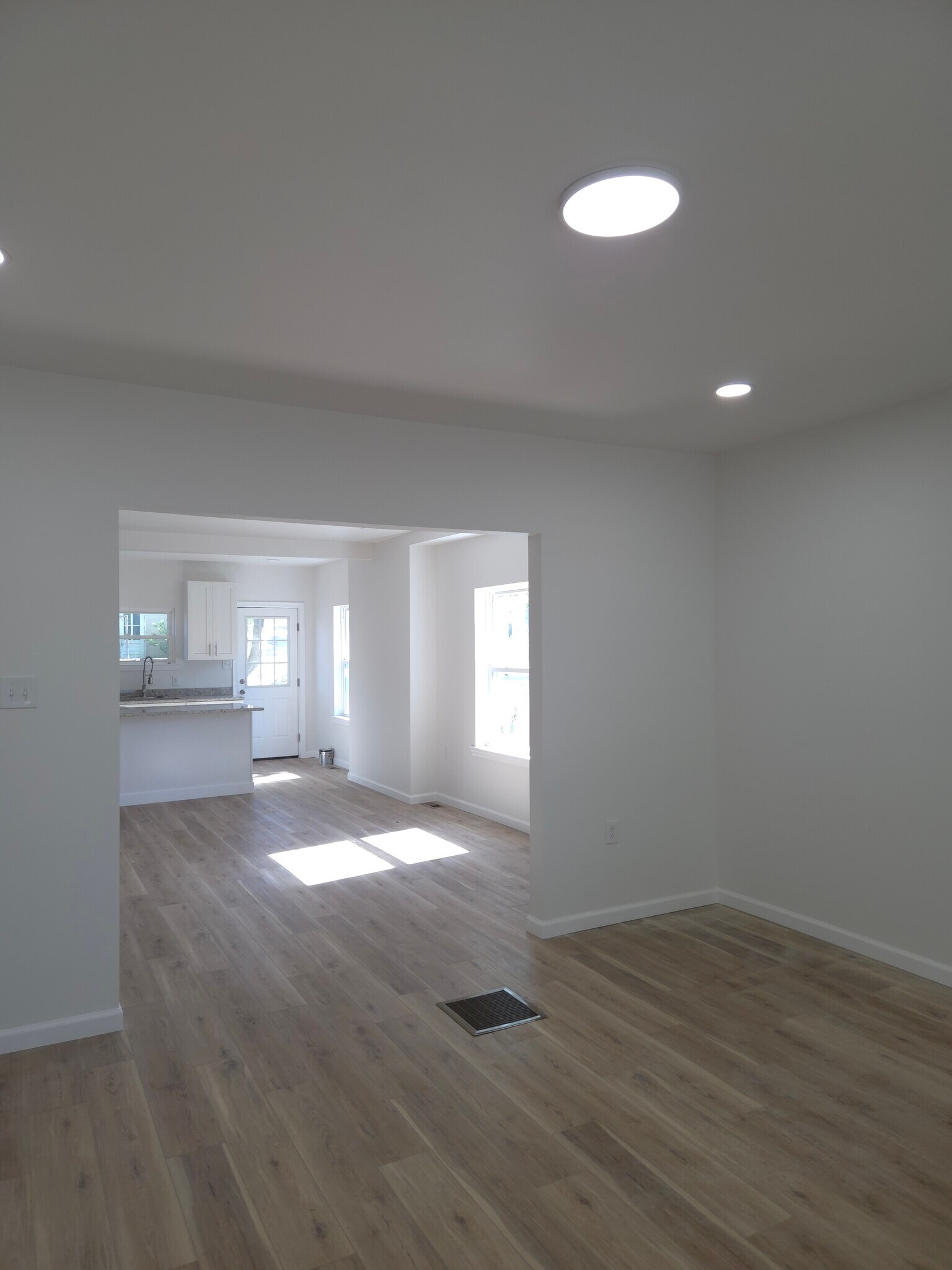 Open concept first floor living and dining area - 69 W 5th St