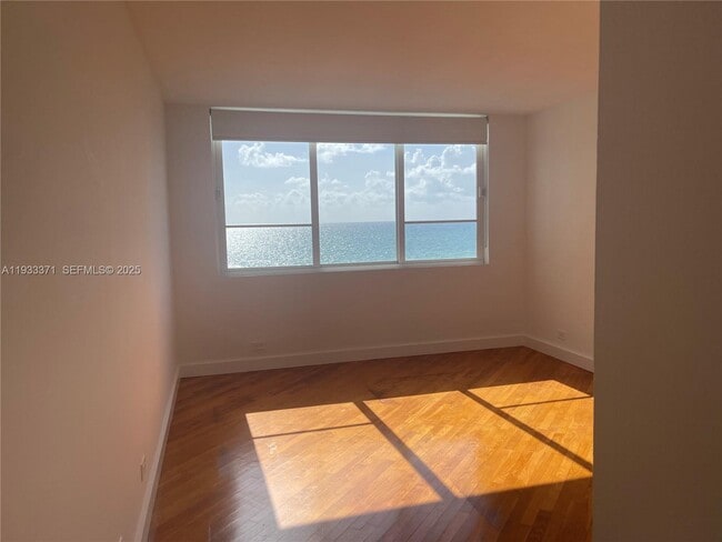 Building Photo - 5005 Collins Ave