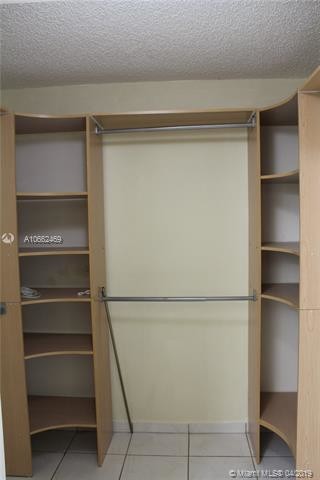 Building Photo - 4680 NW 102nd Ave  104-20