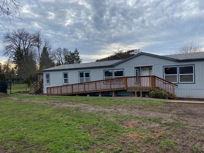 Primary Photo - 2662 sf 3 bedroom home on one fully fenced...