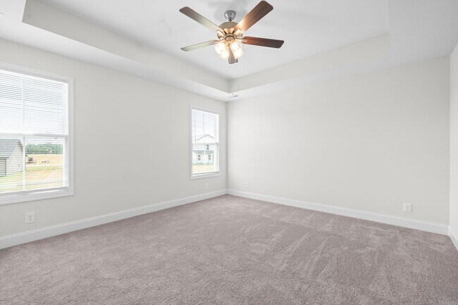 Building Photo - Pet Friendly Three Bedroom with Bonus!