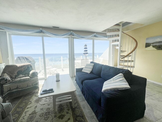 Building Photo - WINTER RENTAL Beach-front condo September ...