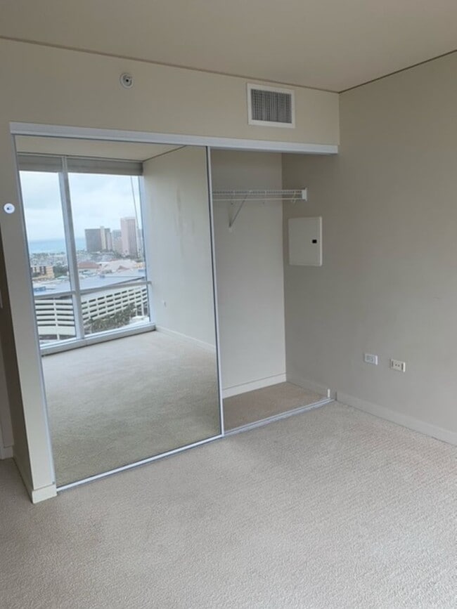 Building Photo - Moana Pacific - 2 bedroom plus den, 2 bath Condo with 2 parking - avail now!