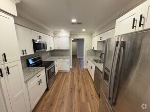 Building Photo - Totally redone 4 bedrooms townhouse.