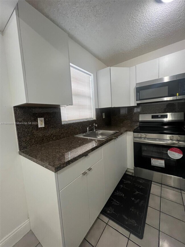 Building Photo - 5935 W 26th Ave