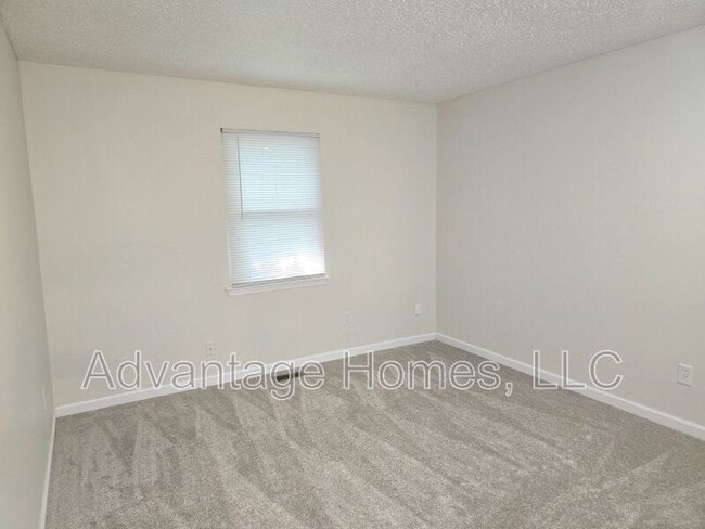 Building Photo - 8206 Woodson Dr