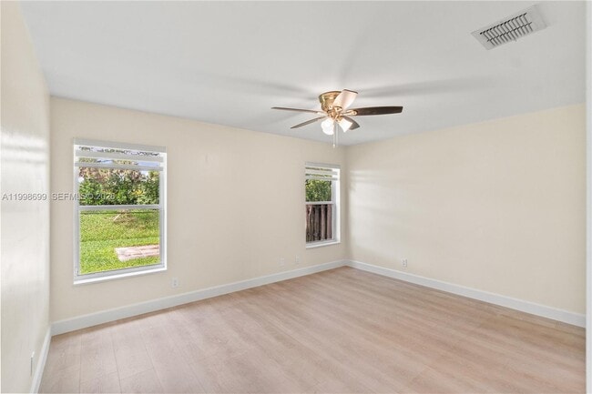 Building Photo - 9081 Lake Park Cir N