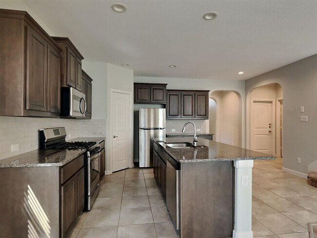 Building Photo - 5BR/4BA | Updated Single Family Home | 2-Car Garage | Gated backyard